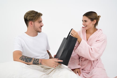 Valentine's day idea couple exchanging gifts